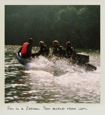Fun in a Zodiak. Tom second from left.