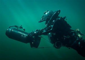 A Special Operations Forces combat swimmer with a diver propulsion vehicle.